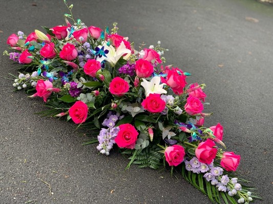 Rose , Delphinium and Dendrobe Casket Spray